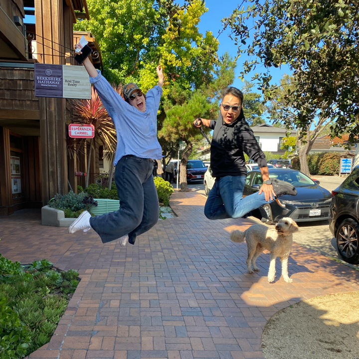 Scavenger Hunt participants jumping with joy